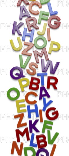 Vertical plastic magnetic letters with drop shadow randomly scattered on surface with drop shadow
