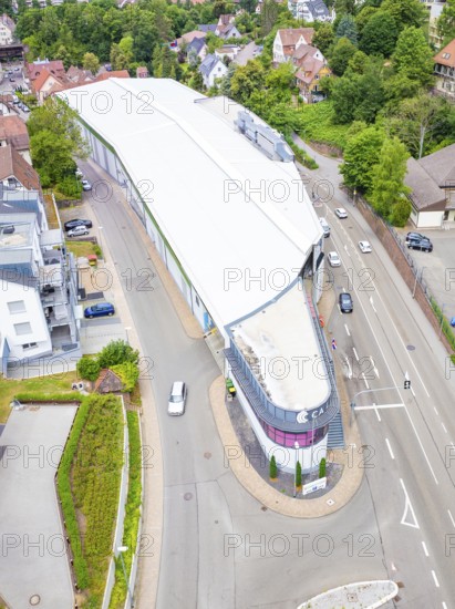 Aerial view of a modern building on a street corner in an urban environment, City Centre Calw,