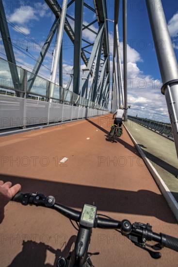 Ride over the Snelbinder Brug bicycle and pedestrian bridge, over the river Waal near Nijmegen, was