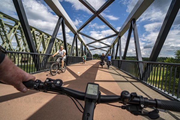 Ride over the De Massover cycle path bridge, over the Meuse south of Nijmegen, near Cuijk, part of