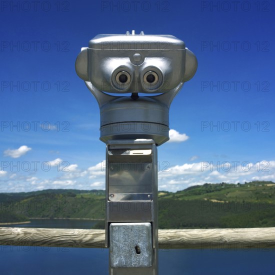 Visitors use the coin-operated binoculars in Auvergne, France, to enjoy breathtaking views of the