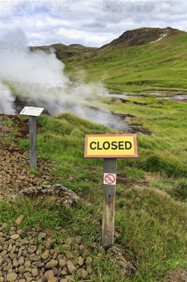 Sign with inscription closed, warning, do not enter, steaming valley, Reykjadalur bathing area,