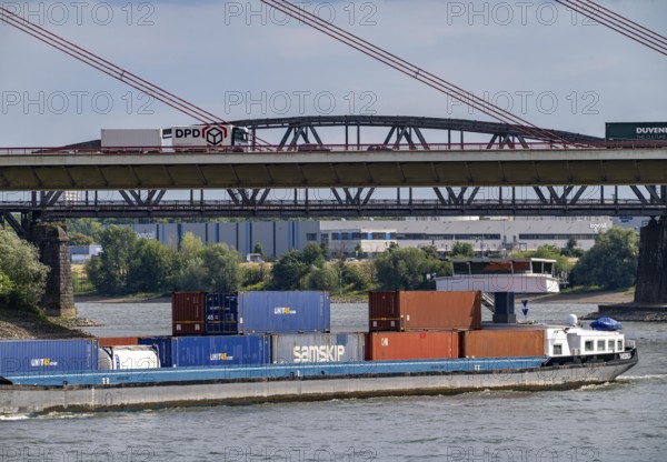 The Rhine near Duisburg, cargo ship, Beeckerwerther Rhine bridge, A42 motorway, Haus-Knipp railway