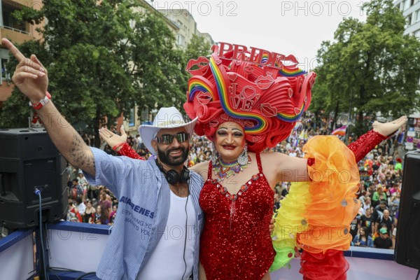 Michelle de la Rose (right) together with a DJ on one of the floats at CSD Berlin under the motto -