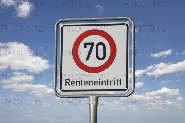 (Photomontage) Traffic sign with the inscription RENTAL ENTRANCE 70, detached in front of a blue