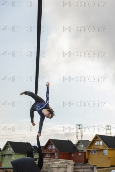 Aerial acrobatics, girls, catch for King Harald as part of the end of coal mining, Longyearbyen,