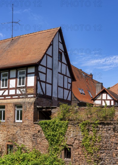 The old town centre with half-timbered houses, church towers and remains of the town wall in