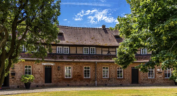 The old castle with Barbarossaplatz and the castle café in the old town centre of Büdingen, Hesse,