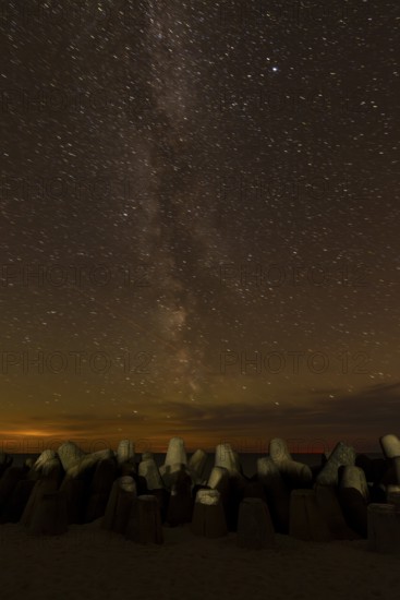 Northern Lights with Milky Way at the North Sea, Hörnum, Sylt, Tetrapode (stone),