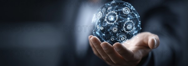 Businessman holding a digital sphere with global network and gears icons on a dark blue background,