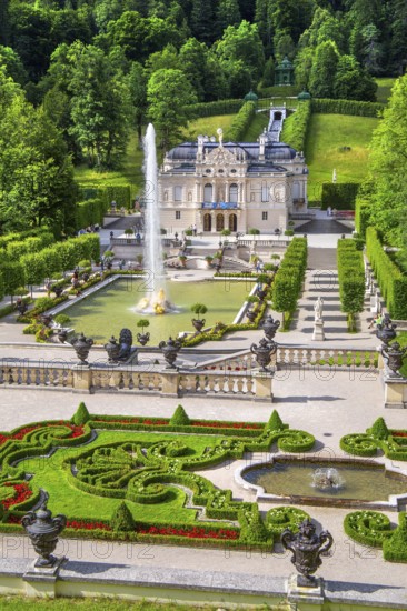 Baroque gardens at the Temple of Venus with a view of the water parterre and Linderhof Palace,