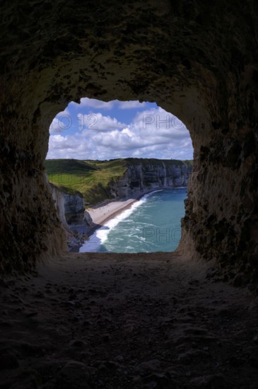 View through the eye of the panda, L'oeil du Panda, rock window, cave, in the rock arch Falaise
