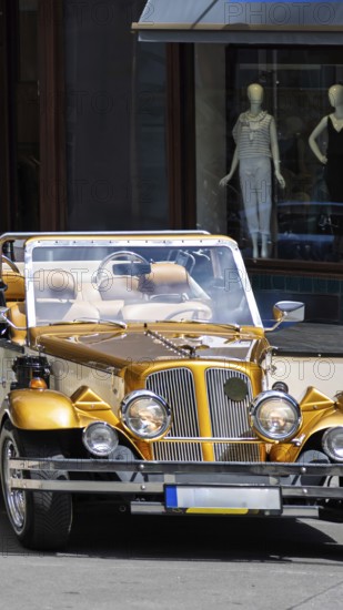 Prague, Old city center, tourism tours and sightseeing in old retro vintage cars
