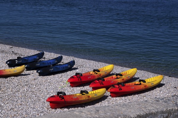Kayaks, boats, colourful, lying on the beach, pebble beach, Étretat, sea, Normandy, Seine-Maritime,