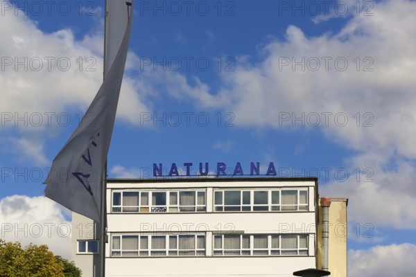 Naturana Miederfabriken, company building of Naturana Dölker Textilbekleidung, lettering, flag,