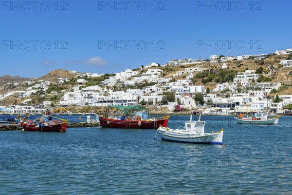Mykonos, Cyclades, Greece - fishing boats are moored in the old port of Mykonos Town, Mykonos Chora