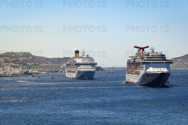Mykonos, Cyclades, Greece - cruise ships CARNIVAL MIRACLE and COSTA FORTUNA are located in the bay