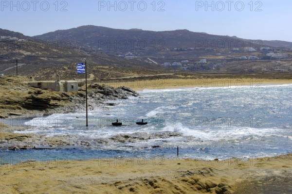 Mykonos, Cyclades, Greece - Ftelia Beach, Ftelia Beach, sandy beach on a windy rocky coast in the
