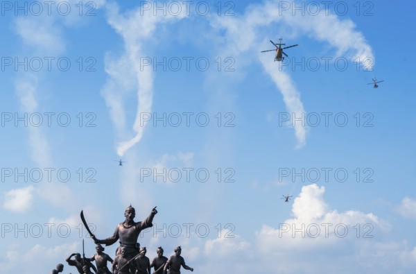 Indian Air Force aerobatic team performs during rehearsals ahead of the air show organised as part