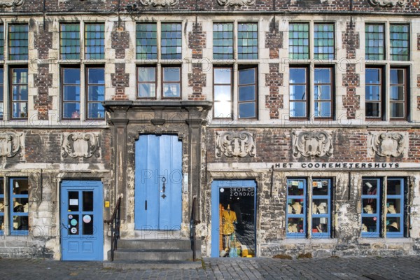 Façade of 17th century baroque guildhall Korenmetershuis at the Graslei in the city Ghent, East