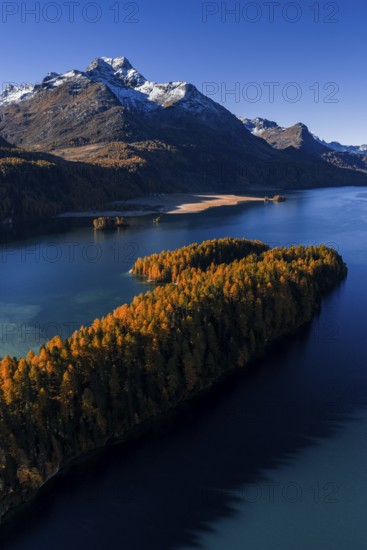 Mountain landscape, mountain lake, larch forest, autumn, autumn color, morning light, sunny, aerial