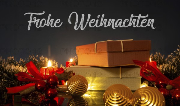 Christmas greetings: table with Christmas decoration and gifts against a blue background with