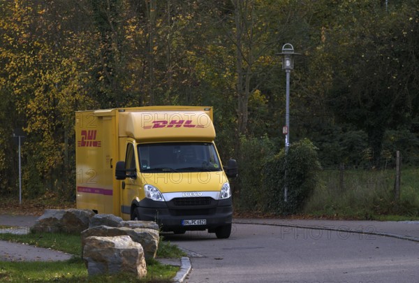 DHL delivery vehicle, logo, delivery, parked in residential area, Bietigheim-Bissingen,