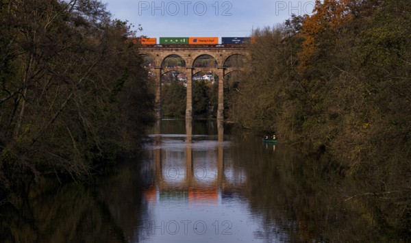 Freight train, container from Hapag-Lloyd, UASC, train stains on railway viaduct, viaduct, railway
