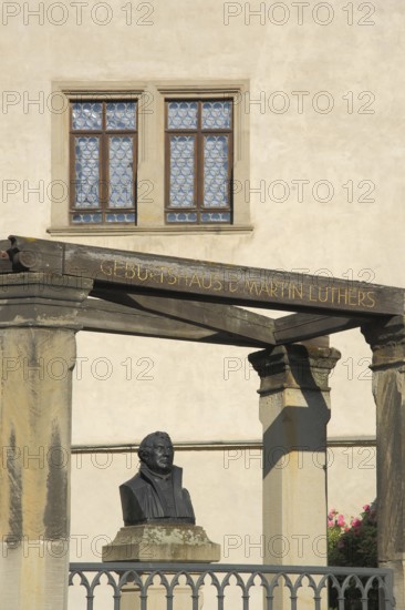 UNESCO Luther's birthplace with bust of Martin Luther, memorial, inscription, Luther city Eisleben,