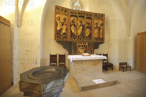 Baptismal font and folding altar, St. Petri Pauli church and baptistery by Martin Luther,