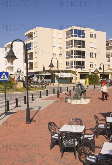 Pedestrian area at the harbor, tables and chairs of a cafe, Moraira, former fishing village, pearl