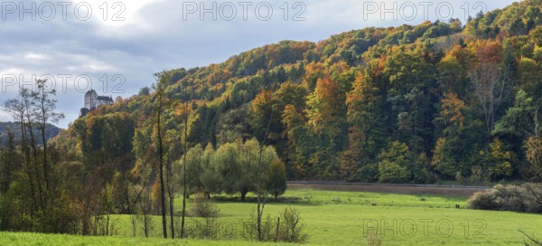 Mixed autumn forest, Egloffstein Castle on the left, Egloffstein, Franconian Switzerland, Upper