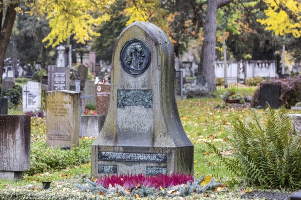 Honorary grave of poet Eduard Mörike. Pragfriedhof Stuttgart in autumn. November is traditionally a