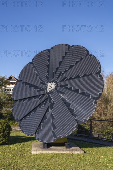 Smart Flower, a sculptural, free-standing all-in-one solar system whose solar modules unfold like a