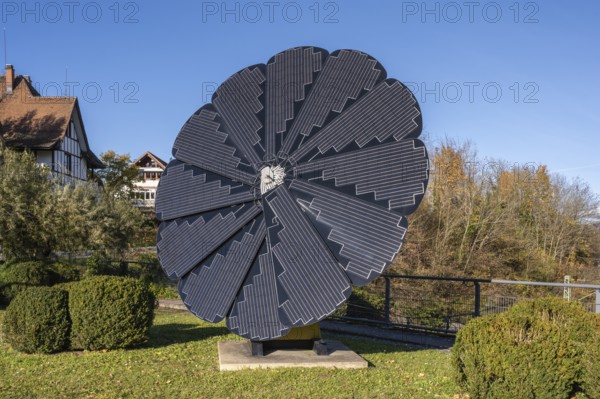 Smart Flower, a sculptural, free-standing all-in-one solar system whose solar modules unfold like a