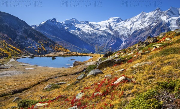 Kreuzbodensee with Alalin 4027 m, Alphubel 420 6 m and Mischabel Group 4545 m in autumn,