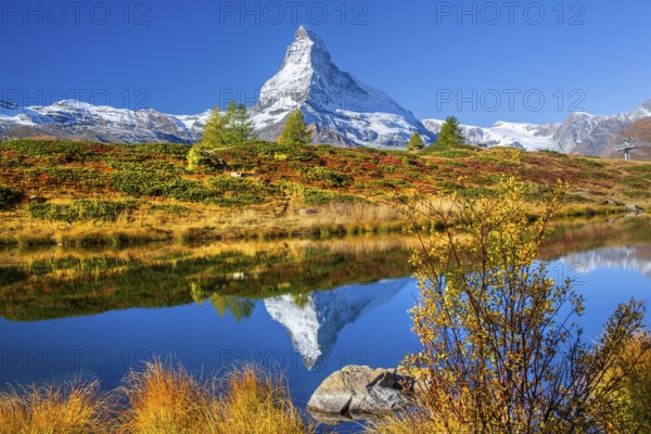 Matterhorn 4478 m with reflection in Leisee on the Sunnegga in autumn, Zermatt, Mattertal, Valais,
