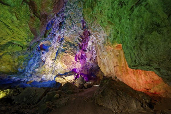 Coloured lighting, fog cave, stalactite cave in the Swabian Jura, stalactites, stalactite forest,