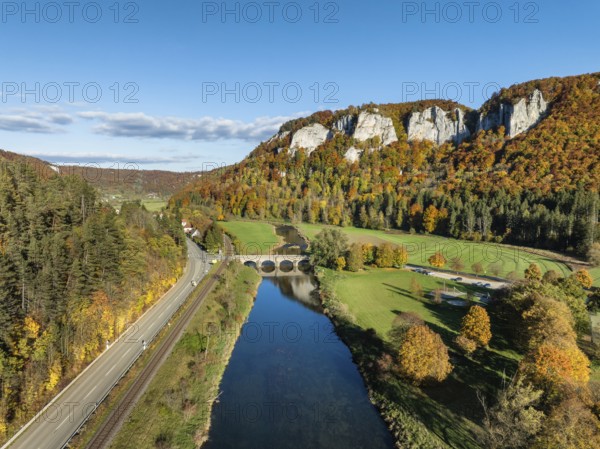 Aerial view of the Upper Danube Valley surrounded by autumn vegetation with the Hausender Peaks