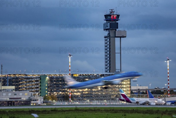 Airplane taking off from Düsseldorf Airport, Air Traffic Control Tower, North Rhine-Westphalia,