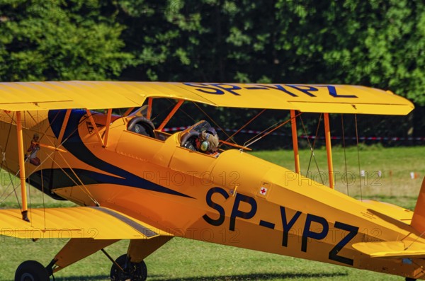 A biplane Bücker Bü 131 Jungmann with registration SP-YPZ during a flight demonstration as part of