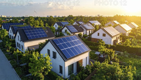 Aerial view showcases modern houses with solar panels and green roofs in a suburban setting,
