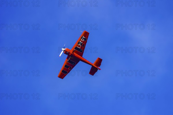 A Soviet Jakovlev Jak-55 sport aircraft with the registration LY-TOY during a flight demonstration