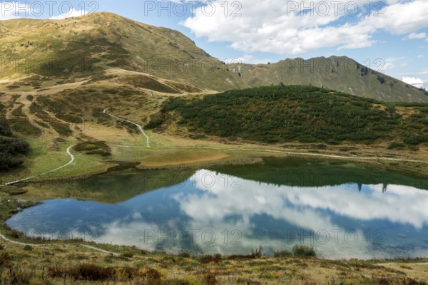 Schlappoldkopf and Söllerkopf are reflected in Schlappoldsee, Fellhorn, Oberstdorf, Oberallgäu,