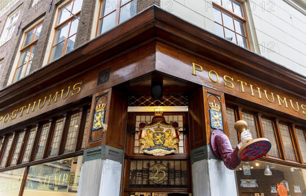 The Posthumus Shop, stationery boutique, shop façade with decorative stamp motifs, St. Luciensteeg,