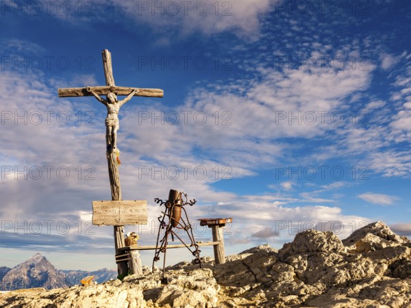 Summit cross and sculpture on the small Lagazuoi, Dolomites, Alps, Belluno province, Veneto region,