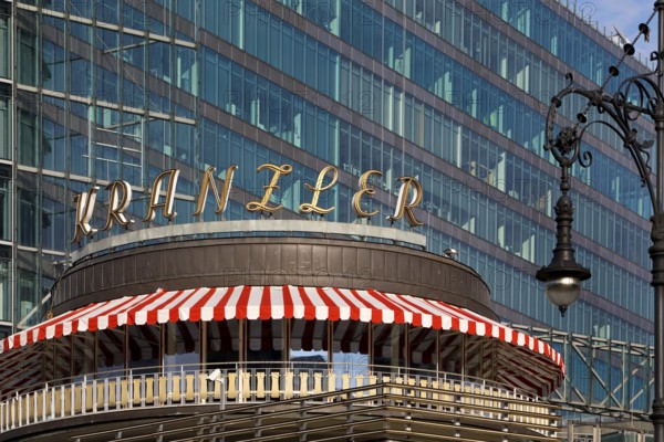 Café Kranzler with historic lantern and modern office building on Kurfürstendamm, Charlottenburg,
