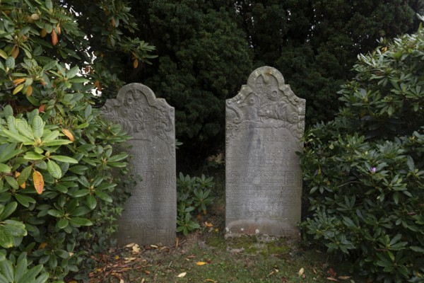 Cemetery of St John's Church with gravestones telling the story of seafarers, known as talking