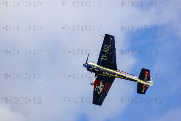 A Jakovlev Jak-55 with the registration LY-AGL during a flight demonstration as part of an air show