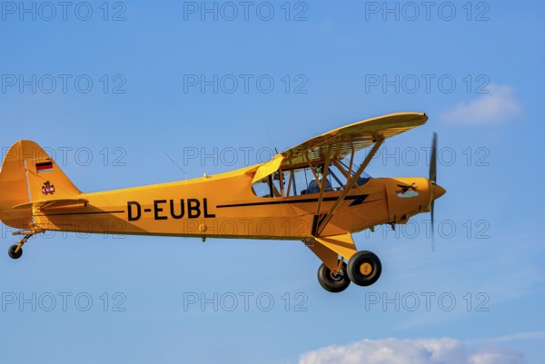 A Piper PA-18 Super Cub of the Bravo Lima Formation during a flight demonstration as part of an air